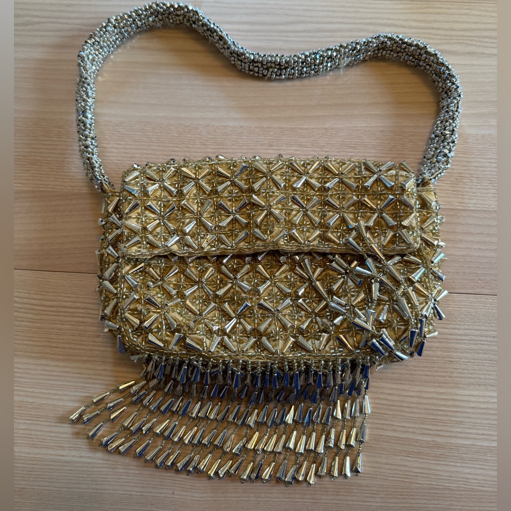 Zara Gold Purse. Magnet enclosure